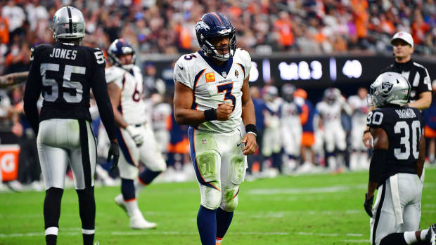 Denver Broncos quarterback Russell Wilson (3) celebrates his touchdown scored against the Las Vegas Raiders during the second half at Allegiant Stadium.